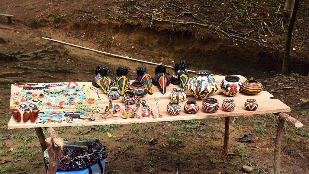 Emberá Tribe handicrafts from Darién displayed on a wooden table