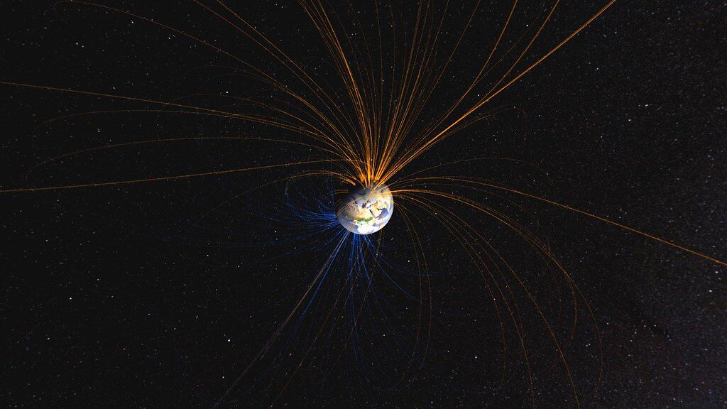 Earth's magnetic field with lines extending into space.
