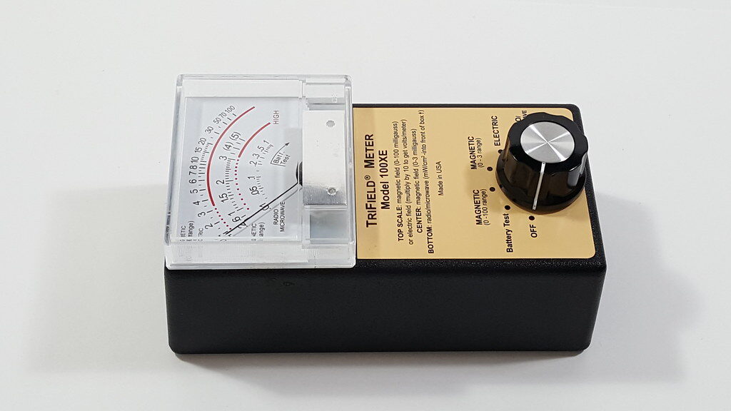 Magnetic field meter placed on a table