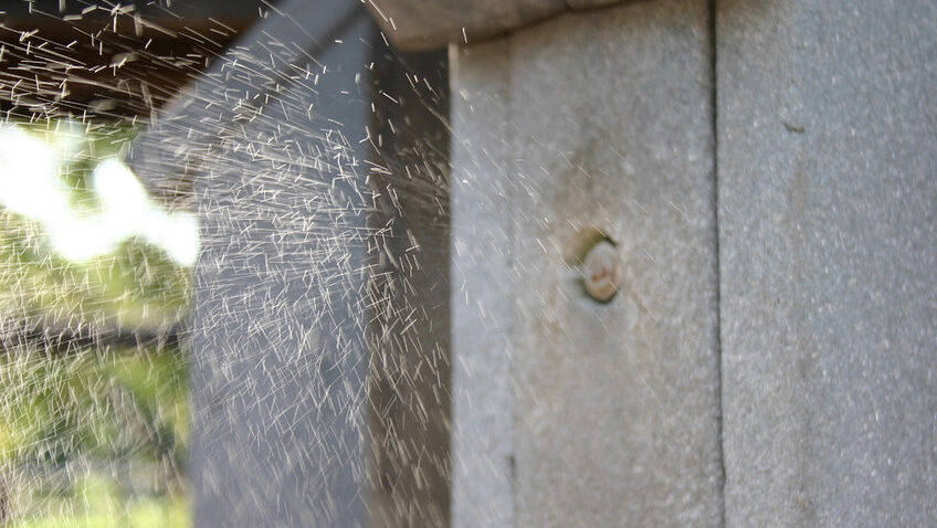 Water mist system installed on a decorative stone column