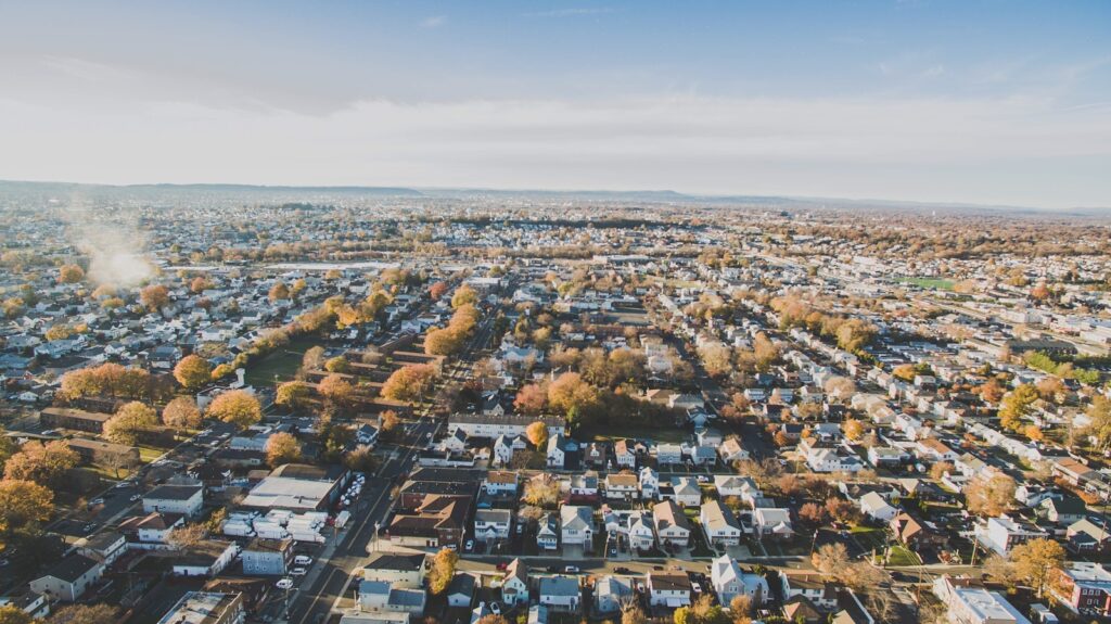 "Aerial view of a residential neighborhood with houses and streets