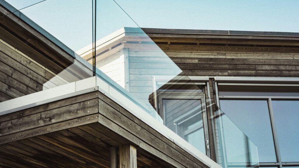 Modern house terrace balcony with clear glass railing