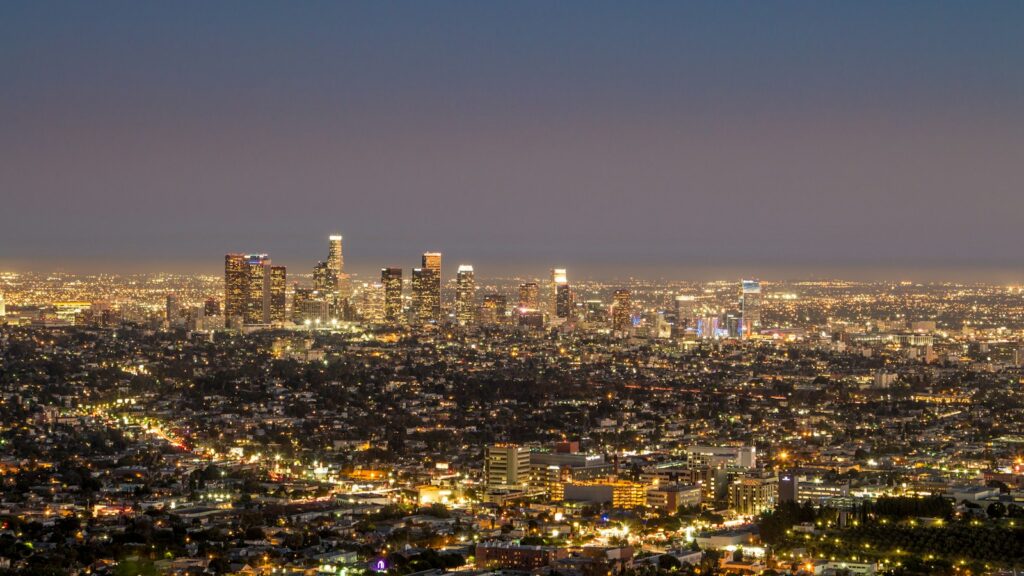 Urban skyline illuminated by city lights causing night sky light pollution