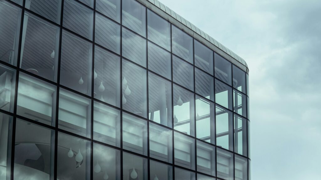 Modern high-rise building with reflective glass walls
