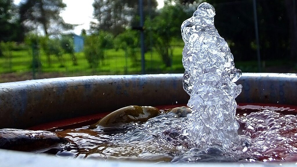 Outdoor bird bath with bubbling water feature