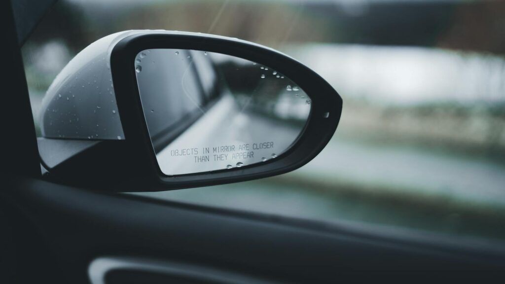 Close-up of a car's side mirror