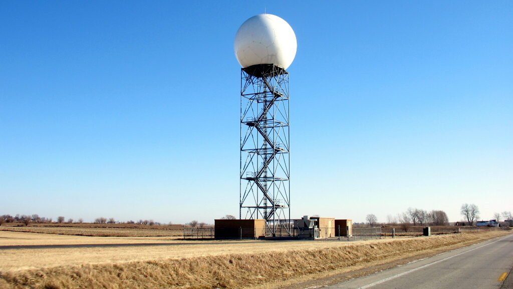 Doppler radar tower positioned near a road