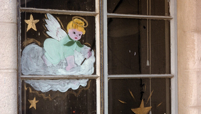 Angel artwork on window glass