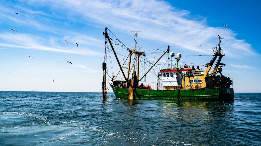 Commercial fishing boa in open ocean waters