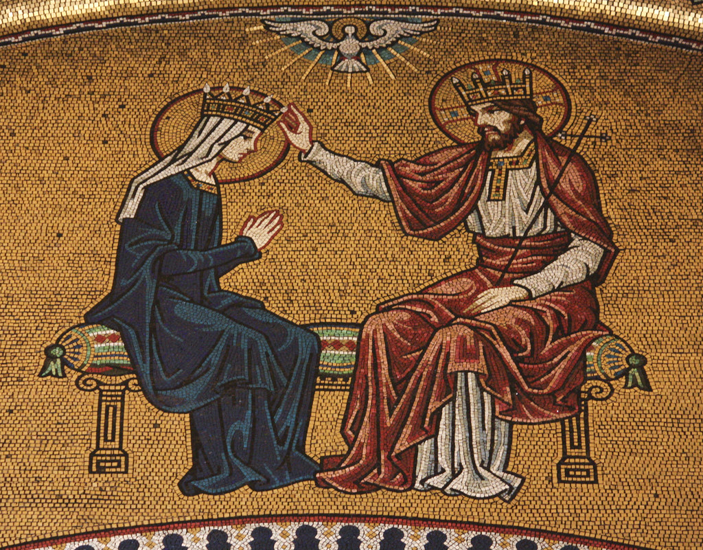 A detailed mosaic shows two crowned figures, with a dove above them.