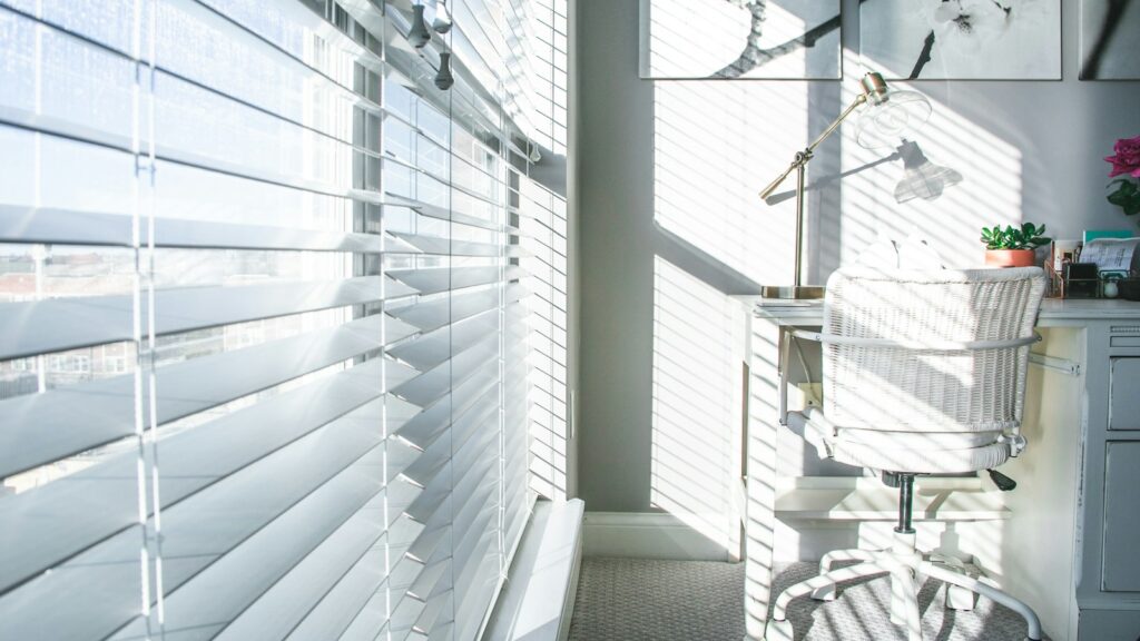 White window with blinds lowered