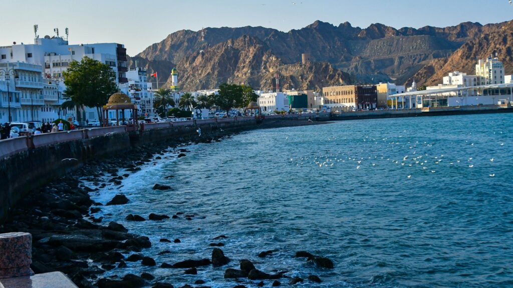 Waves crashing along a scenic coastline of Muscat, Oman
